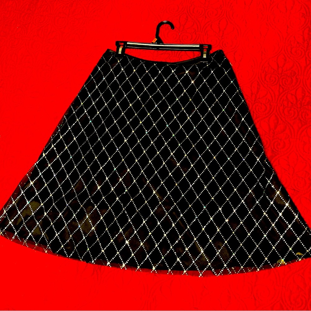 Adrianna Papell size 8 black satin skirt with rhinestone overlay.
